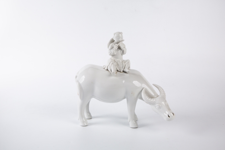 Dehua Blanc-de-Chine Statue of A Fluting Boy on A Bull, Republican Period